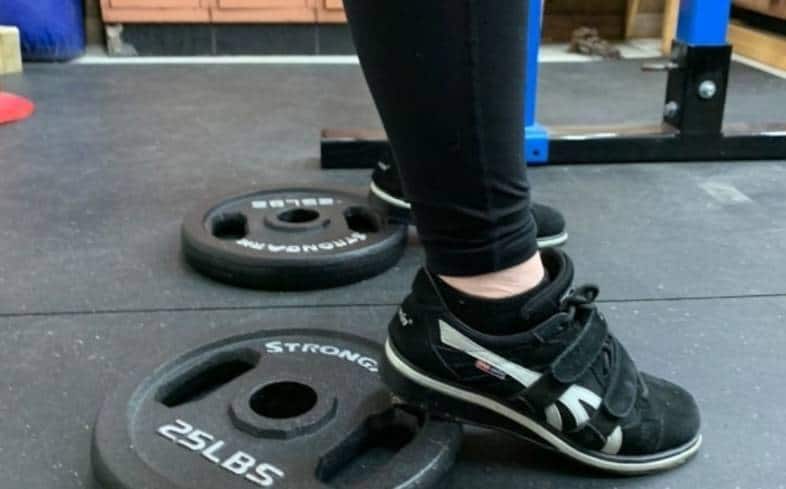 Why & How To Squatting With Plates Under Heels