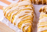 Warm Pumpkin Spice Scones with Maple Drizzle
