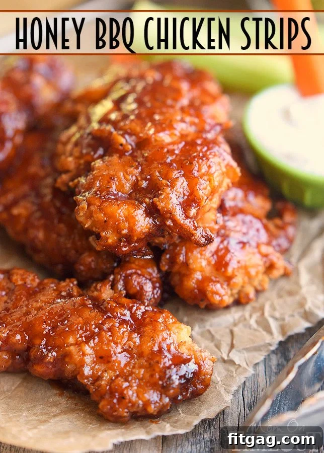 Sticky sweet Honey BBQ Chicken Strips are perfect for dinner or game day! Marinated in buttermilk and perfectly seasoned, these strips are hard to resist! | MomOnTimeout.com
