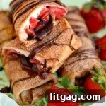 Chocolate Strawberry Cheesecake Chimichangas, a delightful dessert ready to serve.