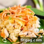 One serving of a Hawaiian chicken casserole on a green plate, ready to be enjoyed.