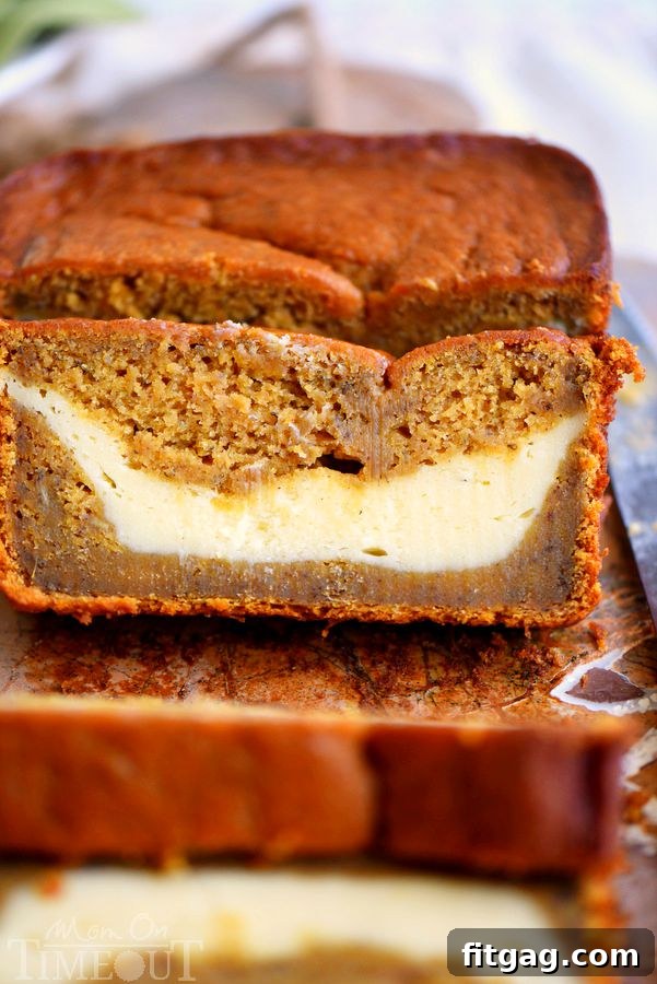 Pumpkin Cheesecake Banana Bread sliced, showing moist texture and cheesecake swirl