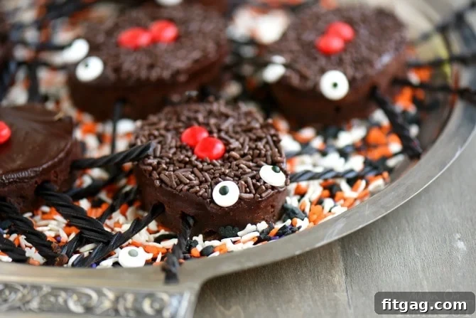 Black Widow's Midnight Fudge Bites 3 Halloween brownies arranged on a serving tray, showcasing the creative spider design.