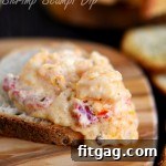 Finished Roasted Red Pepper Shrimp Scampi Dip in a baking dish