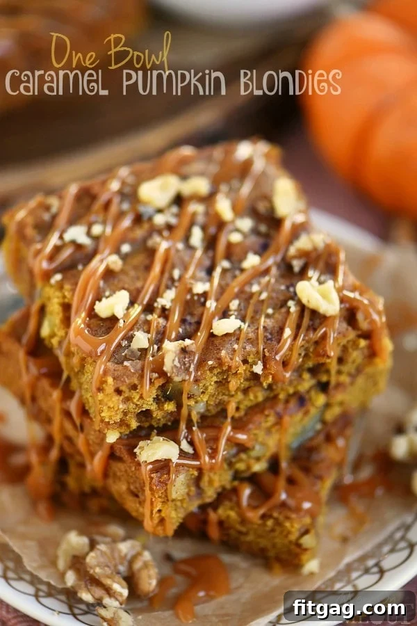 A delicious square of Caramel Pumpkin Blondie, showcasing the rich, chewy texture and pumpkin color.