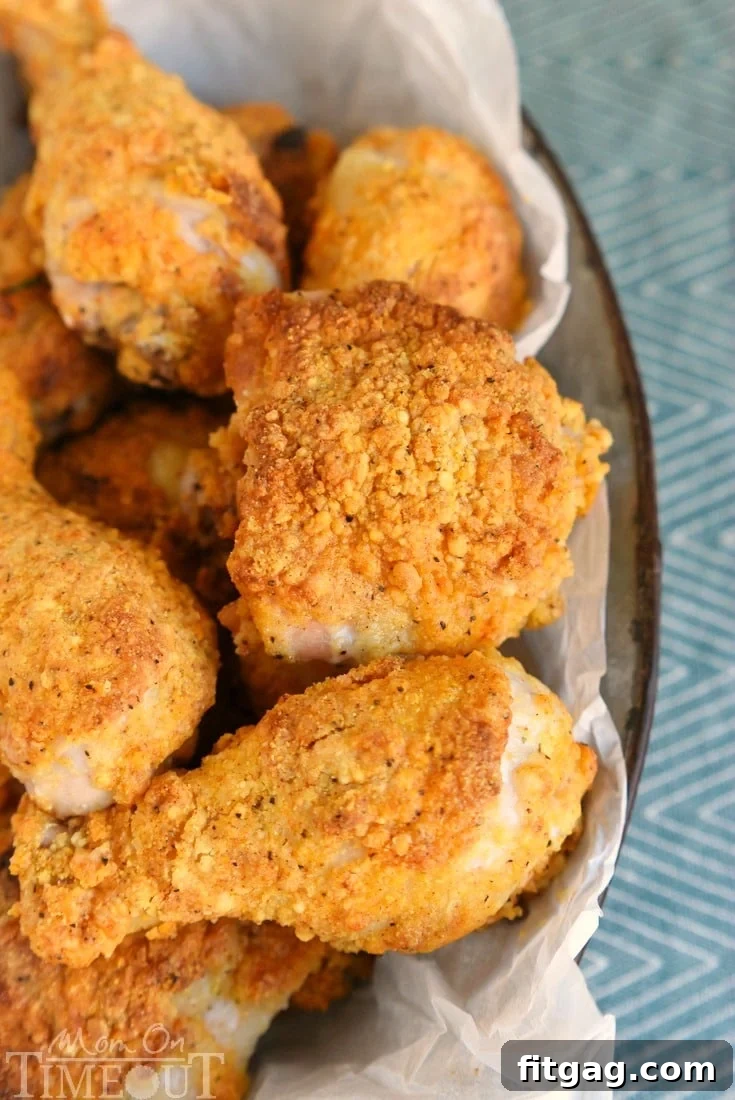 Pile of crispy oven-fried chicken pieces on a plate
