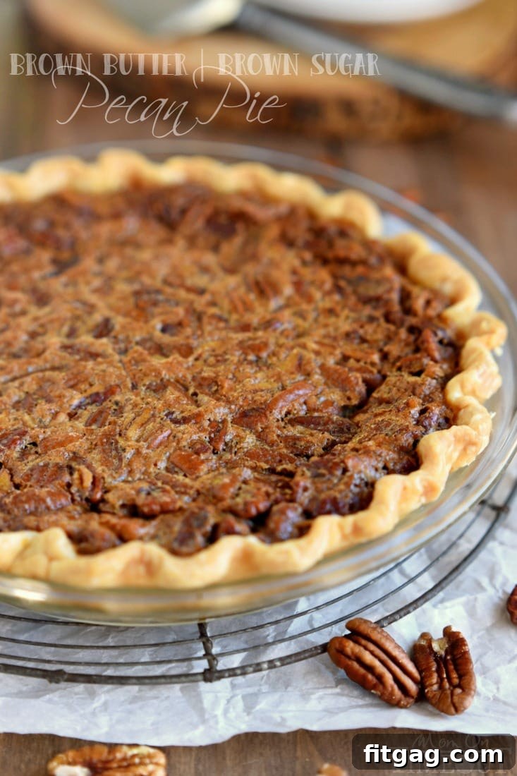 Decadent Brown Sugar Pecan Pie 2 A whole, golden brown sugar pecan pie resting on a cooling rack, perfectly baked for the holidays.