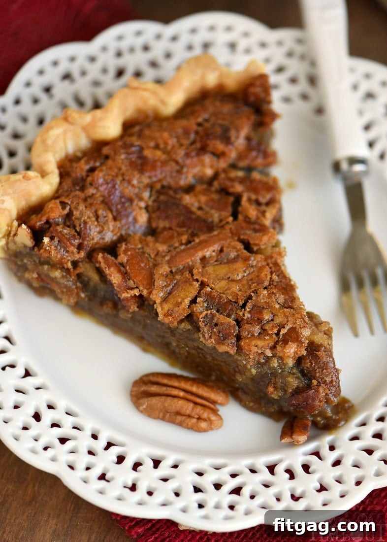 Decadent Brown Sugar Pecan Pie 4 An easy pecan pie recipe, showcasing the beautiful whole pie before slicing.