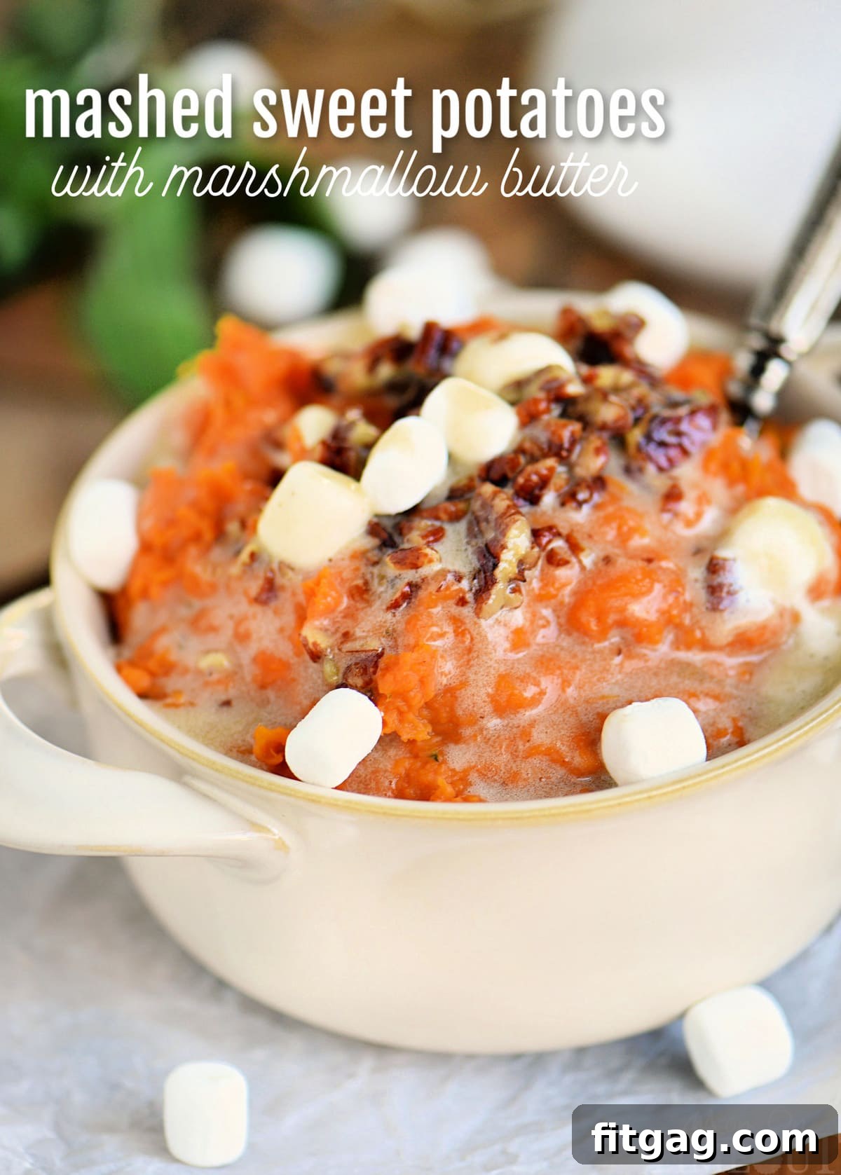 Marshmallow Swirl Sweet Potatoes 2 mashed sweet potatoes topped with marshmallows and pecans in beige bowl with text overlay at top of image