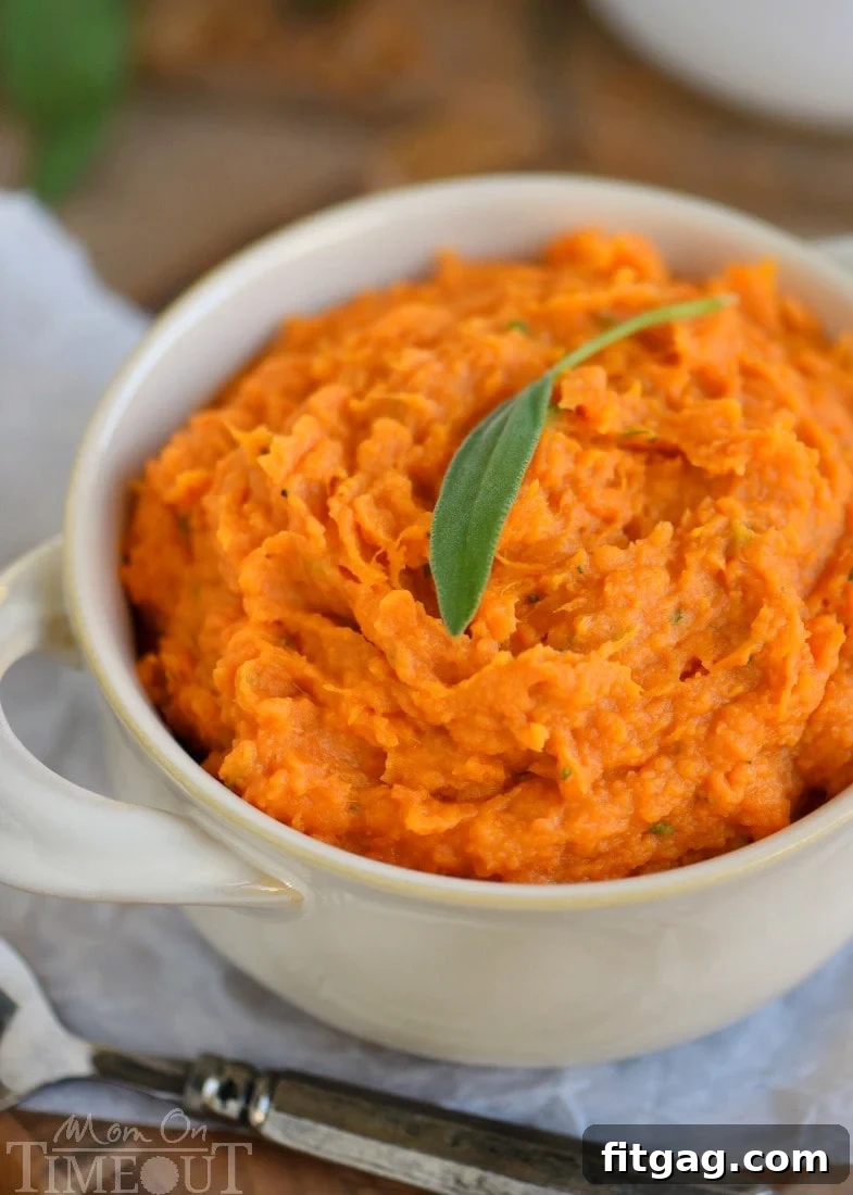Maple Sage Smashed Yams with Marshmallow Butter - the side dish everyone will be yammering about for days (pun intended)! This easy side dish is packed full of flavor, takes less than 30 minutes to prepare, doesn't require the oven, and can be made ahead of time! You're welcome :) // Mom On Timeout #sidedish #side #yams #Thanksgiving #holidays #christmas #momontimeout #recipe #recipes #easy easy-yam-recipe