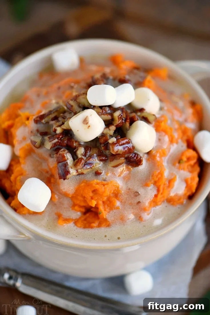 Maple Sage Smashed Yams with Marshmallow Butter - the side dish everyone will be yammering about for days (pun intended)! This easy side dish is packed full of flavor, takes less than 30 minutes to prepare, doesn't require the oven, and can be made ahead of time! You're welcome :) // Mom On Timeout #sidedish #side #yams #Thanksgiving #holidays #christmas #momontimeout #recipe #recipes #easy yam-side-dish-with-marshmallows