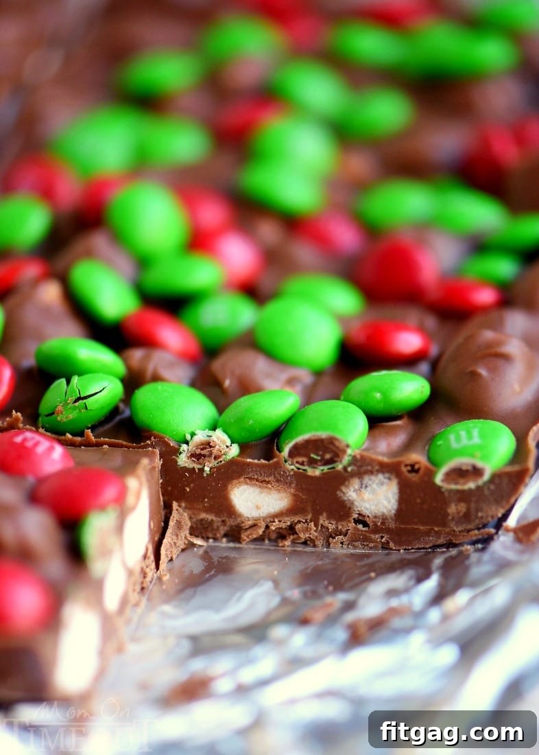 MMs Marshmallow Fantasy Bars 4 Perfectly cut M&M's Marshmallow Dream Bars ready to serve, arranged on a platter.