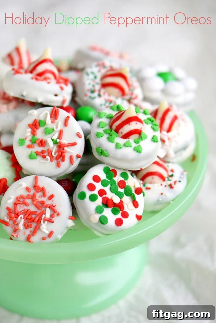 Beautifully decorated Holiday Dipped Oreos on a festive platter