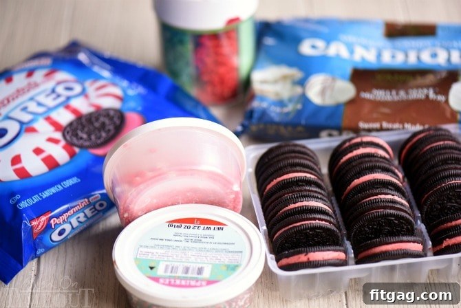 Ingredients laid out for making Holiday Dipped Oreos: Peppermint Oreos, candy melts, and sprinkles.
