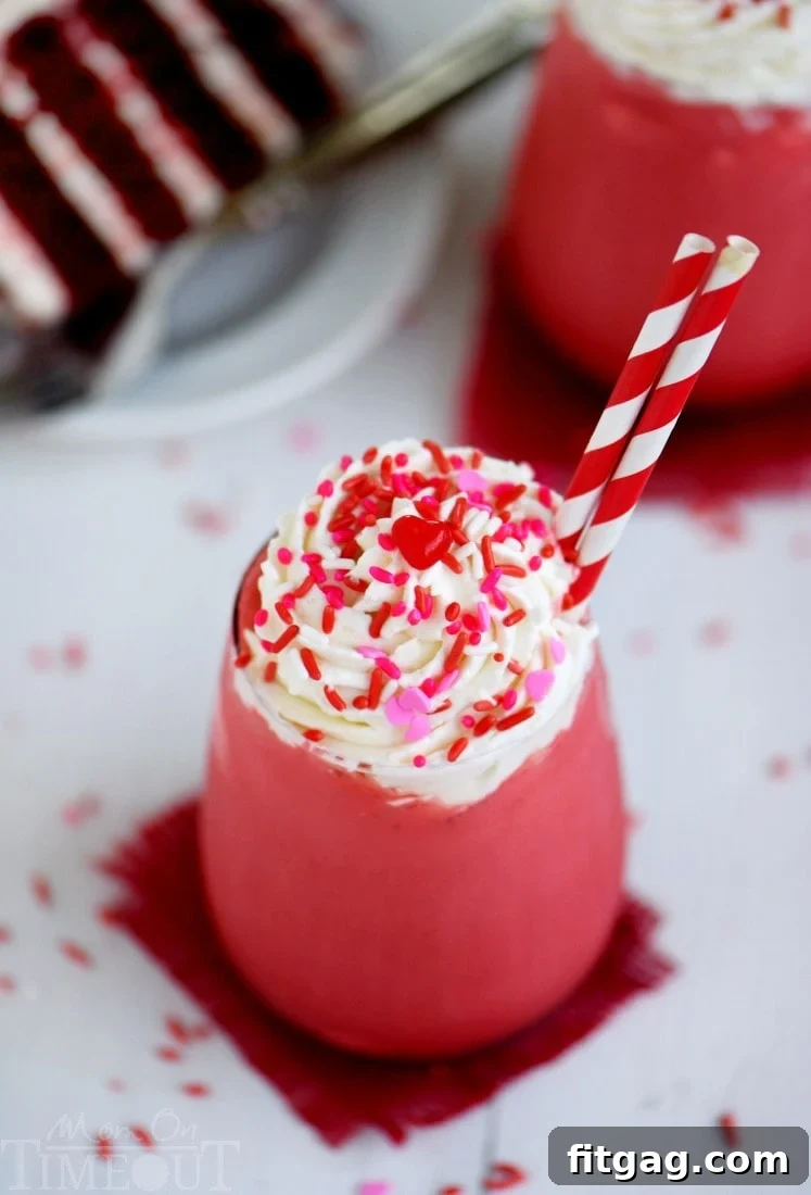 This Skinny Red Velvet Shake is the perfect treat for Valentine's Day or whenever you need a little something special. Topped with a decadent cream cheese whipped cream, this skinny shake is hard to resist! Great for breakfast or dessert!