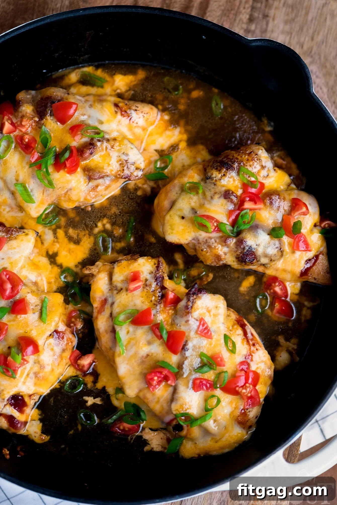monterey chicken top down view in skillet with broth