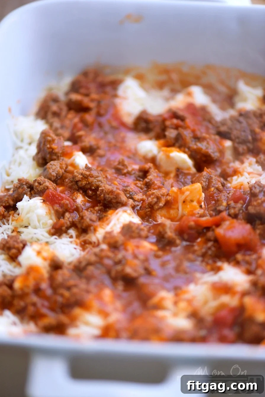 Closeup of the rich and flavorful meat sauce for lazy day lasagna, made with ground beef and marinara sauce.