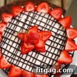 Strawberry No-Bake Cheesecake recipe with a slice showing all layers.
