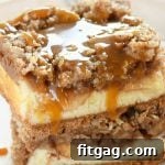 Dutch Apple Pie Cheesecake Bars with caramel drizzle