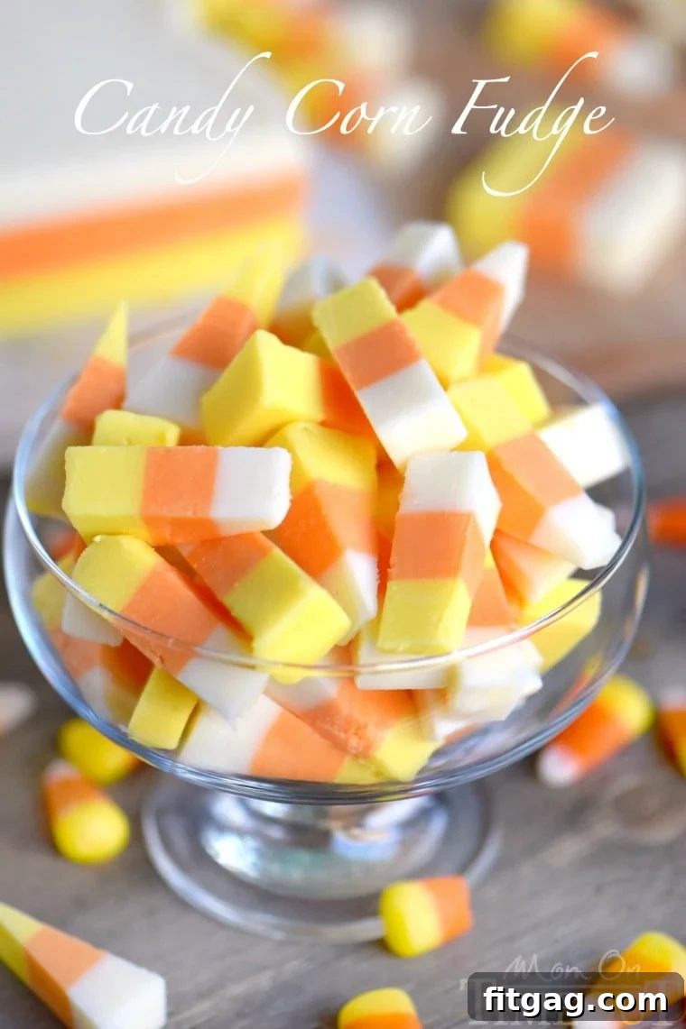 Easy Candy Corn Fudge: A Festive & Creamy No-Bake Treat Easy Candy Corn Fudge - Layers of creamy honey-flavored fudge in classic candy corn colors. Perfect no-bake Halloween dessert.
