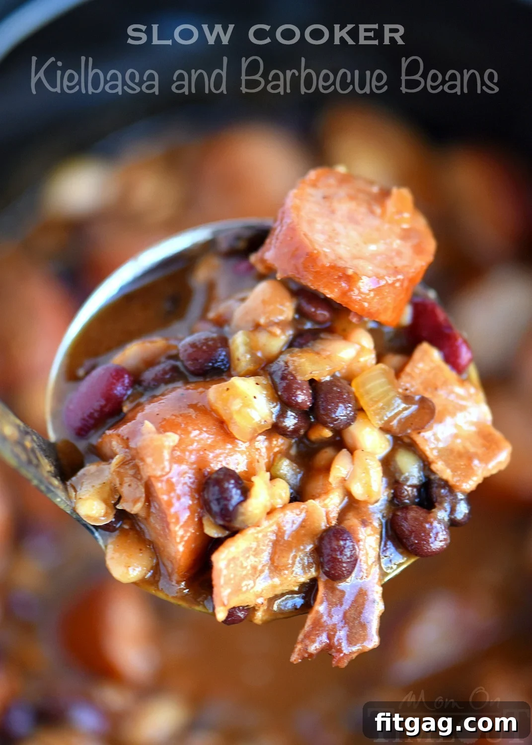 Slow Cooker Kielbasa and Barbecue Beans is the perfect chilly day recipe! Made with three different beans, molasses, bacon, and kielbasa - it's pure comfort food! Slow Cooker Kielbasa and Barbecue Beans recipe, a perfect hearty comfort food for chilly days.