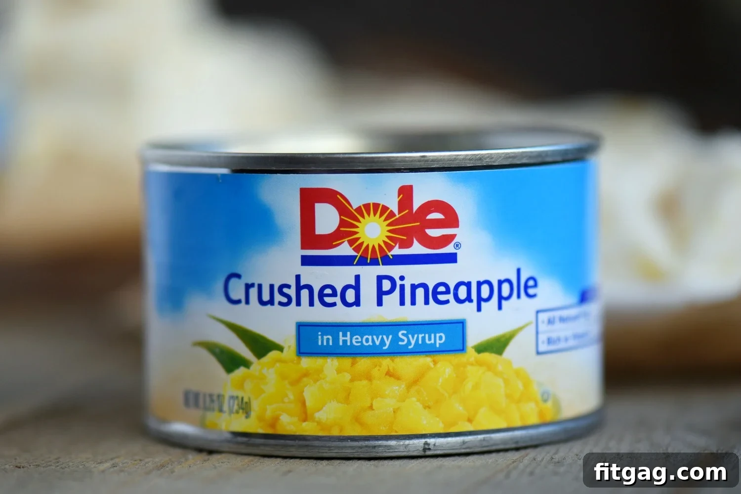 Tropical Pineapple Fudge Bliss 5 A can of Dole Crushed Pineapple, highlighting the key ingredient for this Perfect Pineapple Fudge recipe, emphasizing its high quality and convenience for a delicious tropical dessert. // Mom On Timeout