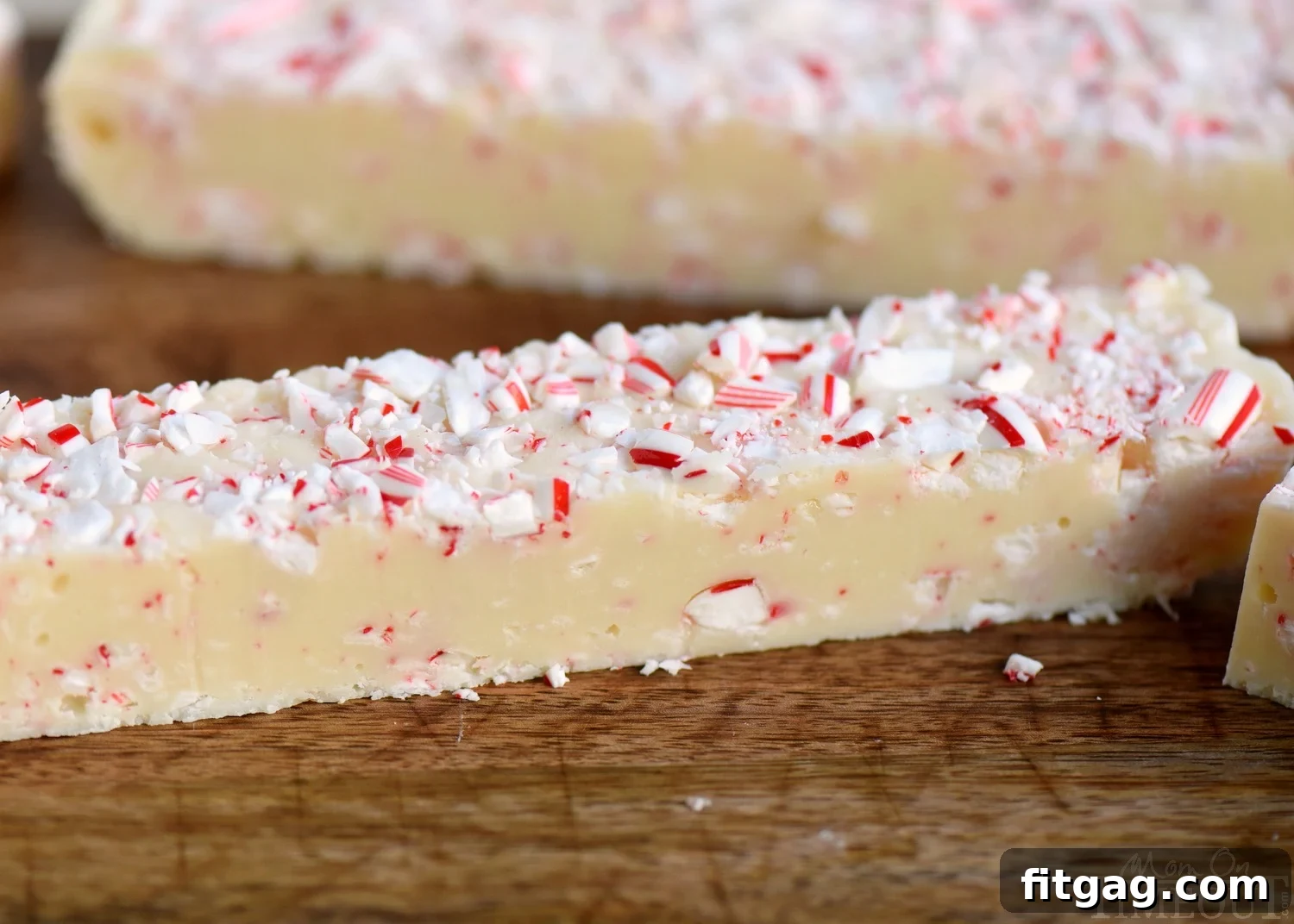 Decadent Peppermint Perfection 2 Delicious Peppermint Fudge squares with white chocolate and crushed candy canes