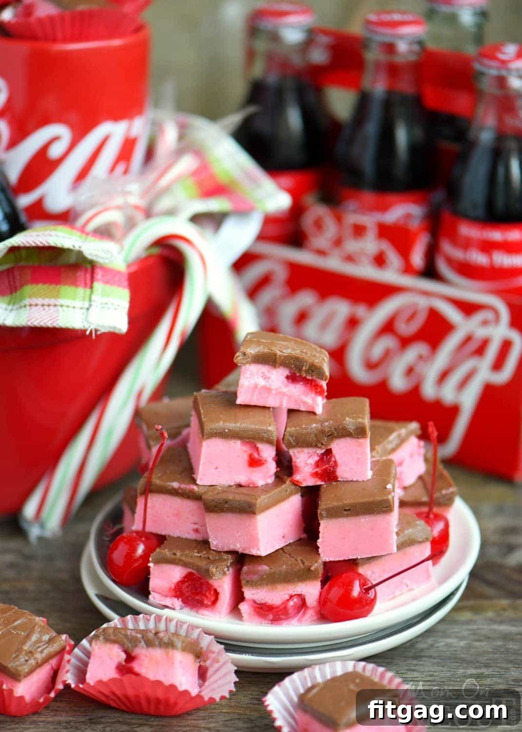 Close-up of Cherry Coke Fudge squares showing the vibrant cherry layer and dark chocolate frosting