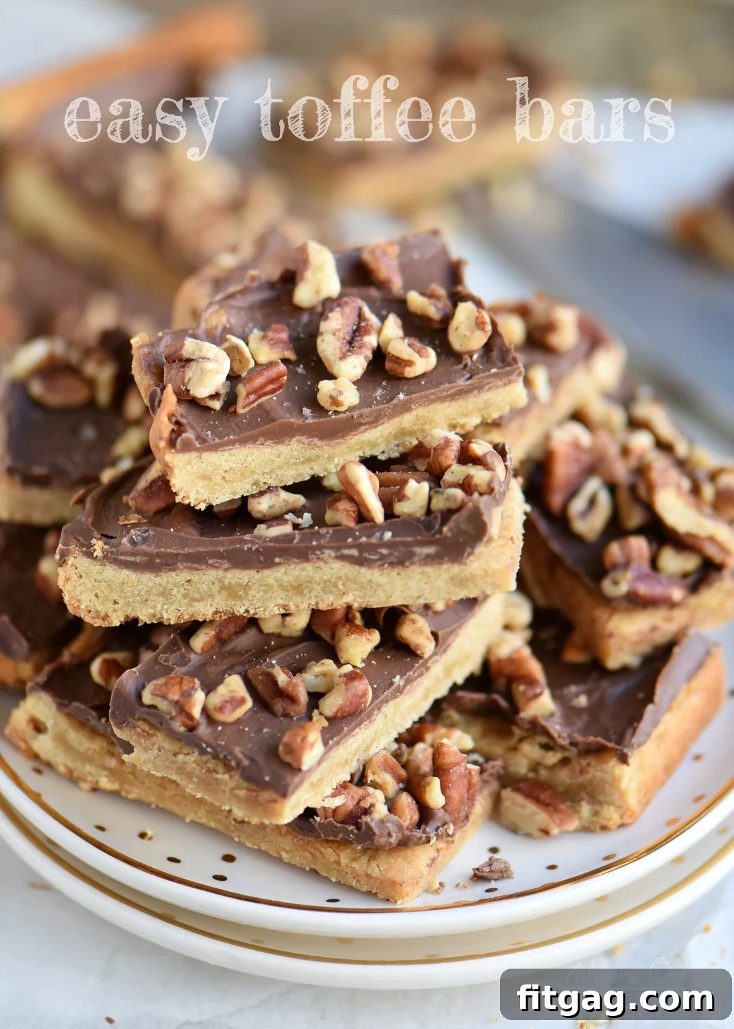Deliciously Easy Toffee Bars topped with milk chocolate and pecans - a perfect quick dessert!