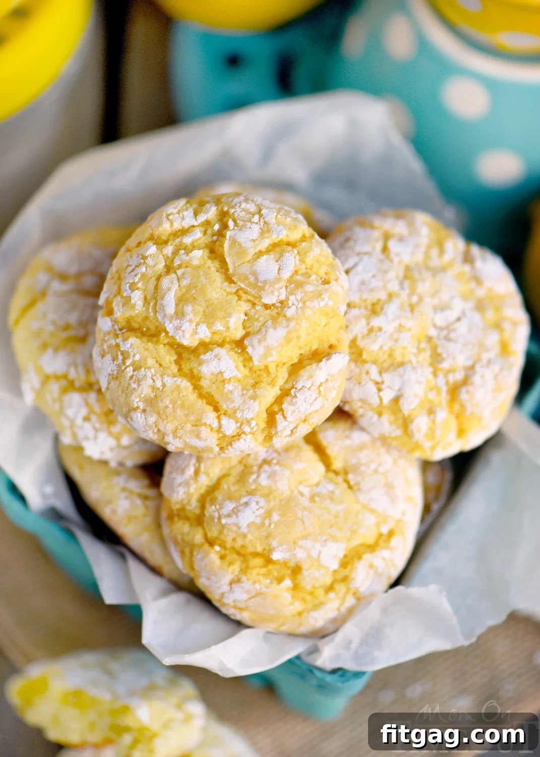 Zesty Lemon Snaps 3 Close-up of freshly baked lemon whippersnap cookies with their signature cracked powdered sugar topping, highlighting their vibrant lemon flavor.