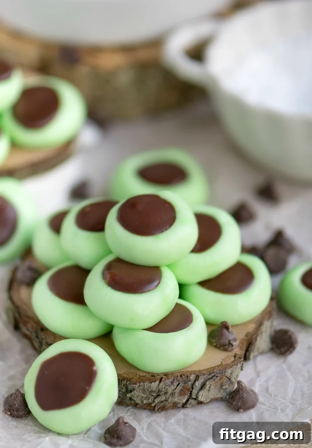 Minty Chocolate Cream Cheese Gems 3 A tray full of perfectly formed green cream cheese mints with circular indentations, ready for the chocolate ganache filling.