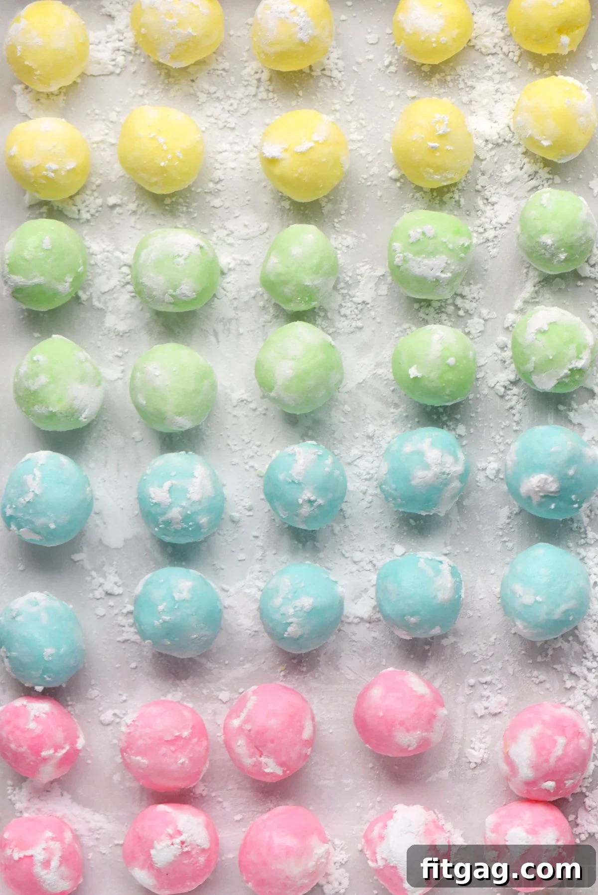Ultimate Cream Cheese Mints 3 Easy cream cheese mints recipe shown in four colors rolled into balls ready to be pressed into mints.