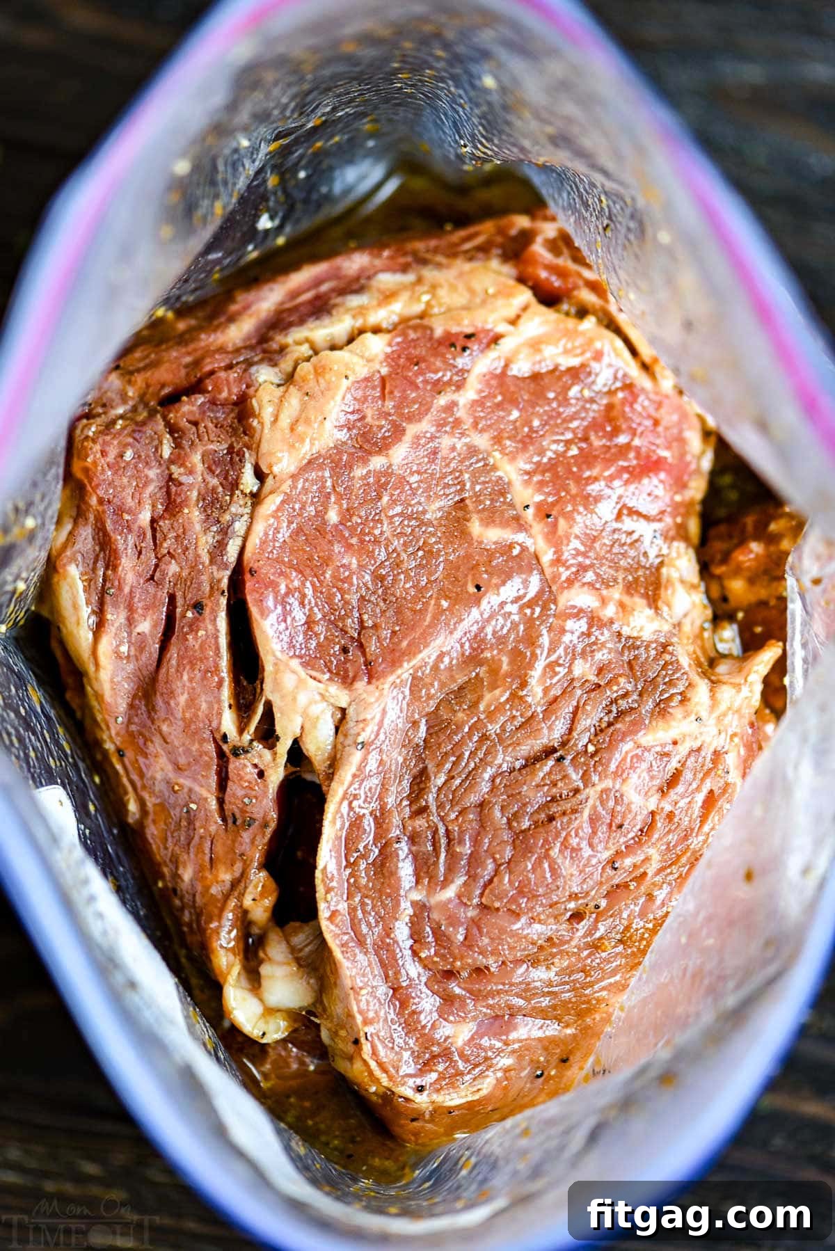 The Ultimate Steak Marinade 2 Steak marinating in a large ziploc bag, ready for grilling, promising a juicy and tender meal.