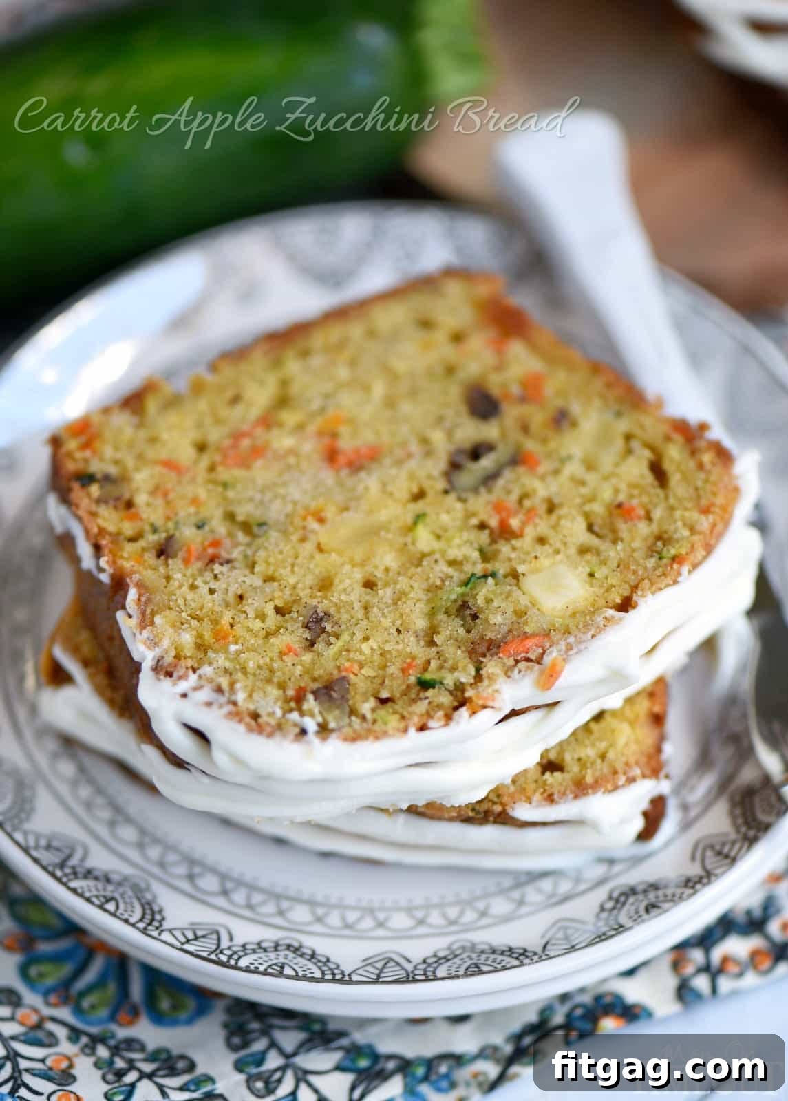 Delicious and moist Carrot Apple Zucchini Bread with cream cheese frosting, perfect for any occasion.