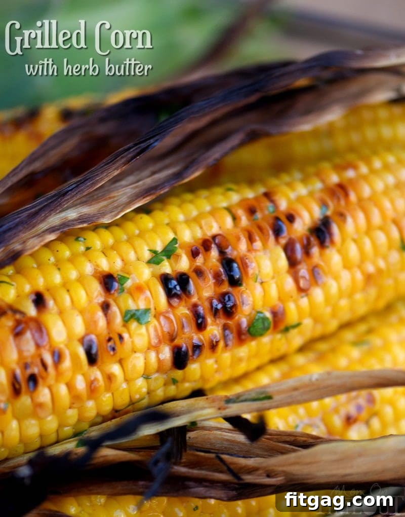 Flame-Kissed Corn with Aromatic Herb Butter 2 Perfectly grilled corn on the cob adorned with melting herb butter, a quintessential summer side dish for any barbecue or picnic.