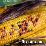 Grilled Corn with Herb Butter on a small plate.