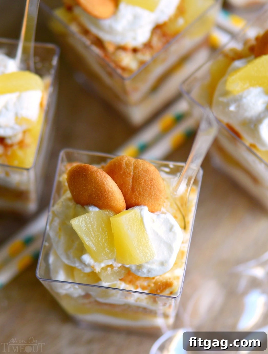 Kids enjoying Mini Pineapple Cheesecake Trifles as an after-school snack.