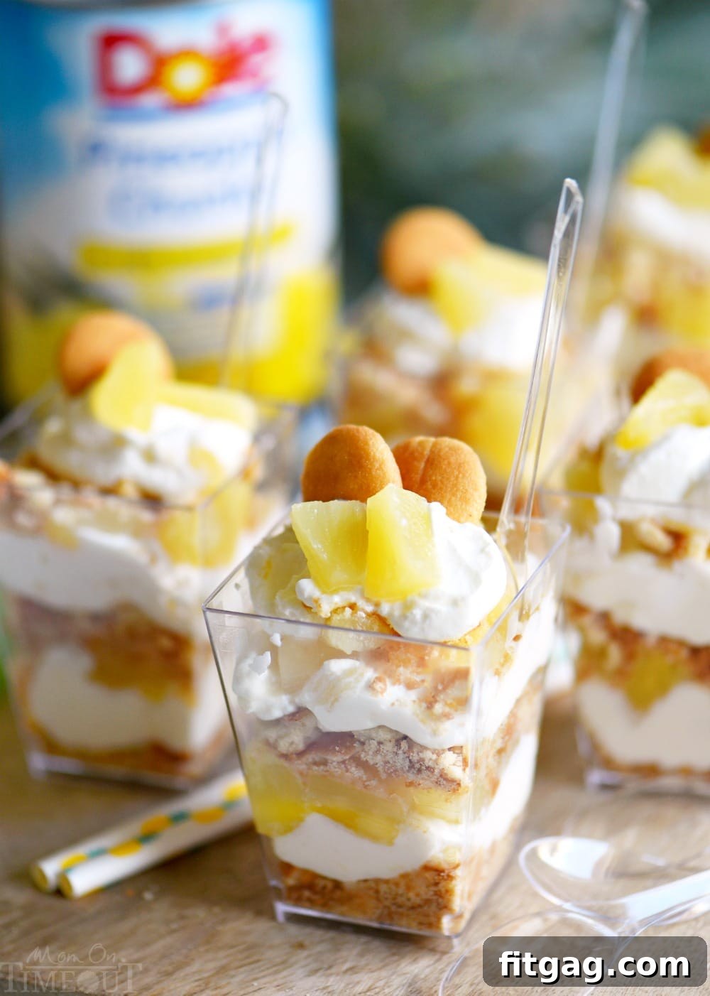 Beautifully layered Mini Pineapple Cheesecake Trifles, perfect for any gathering or family treat.