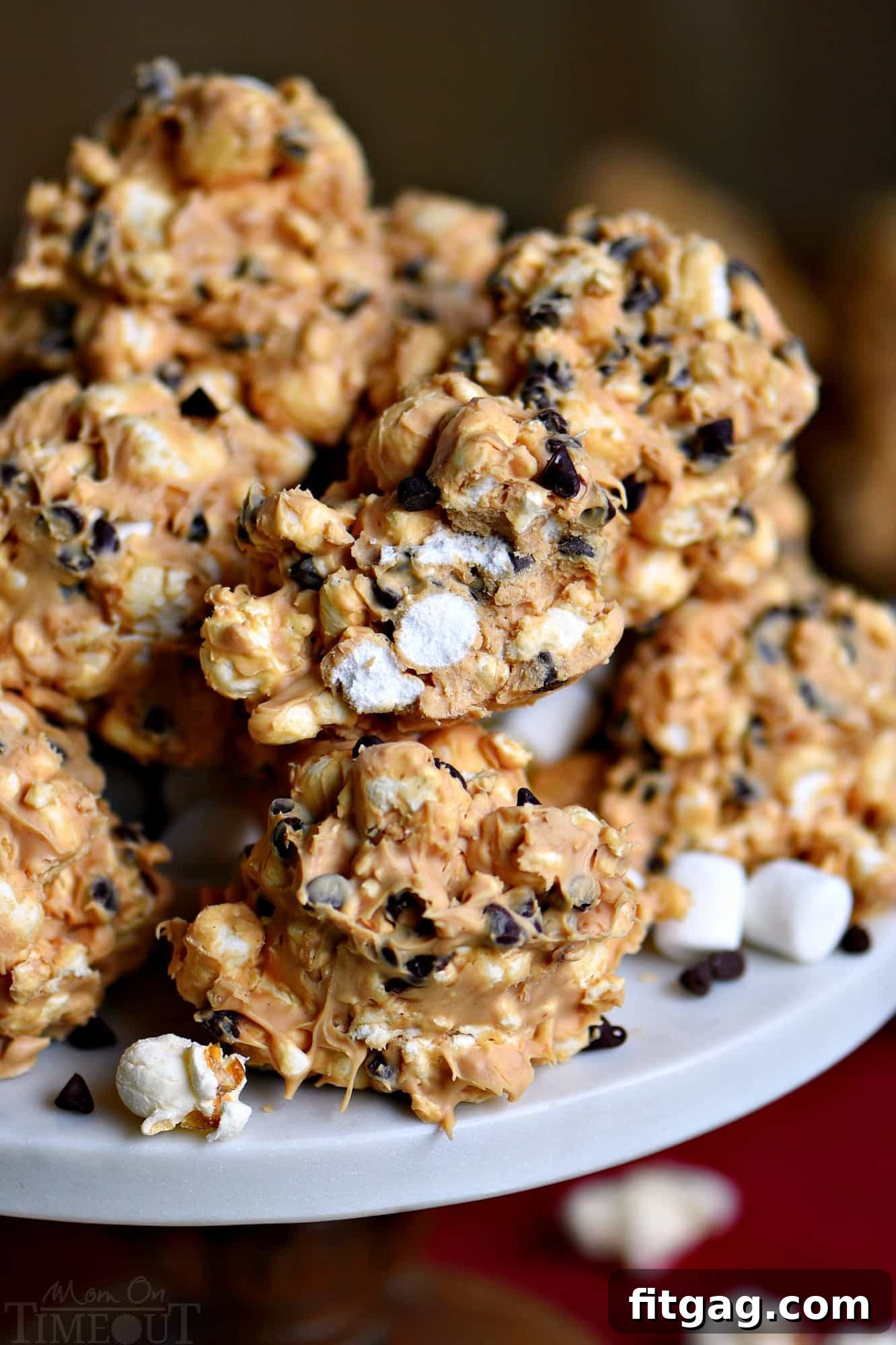 No-Bake Popcorn Avalanche Clusters 4 No Bake Avalanche Popcorn Treats are a must-make for the holiday season! Peanut butter, popcorn, marshmallows and chocolate chips combine for an easy, no bake treat that everyone will love! // Mom On Timeout