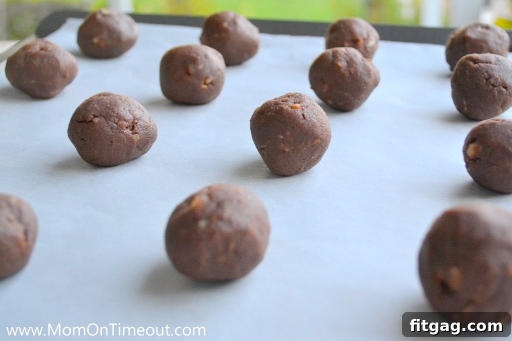 Chocolate Pecan Sandies Dough Balls Chocolate Pecan Sandies Dough Balls ready for baking.