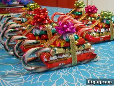 Festive Candy Sleighs Candy Sleighs made with candy canes and holiday treats.