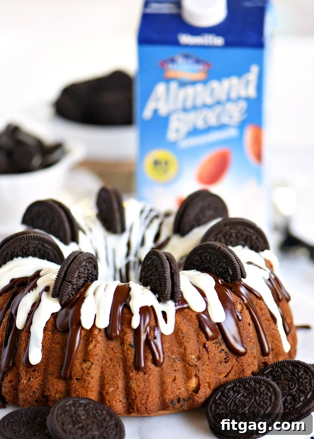 The full, glorious Cookies and Cream OREO Cake in its bundt pan, freshly baked and ready for glazing, highlighting its perfect form.