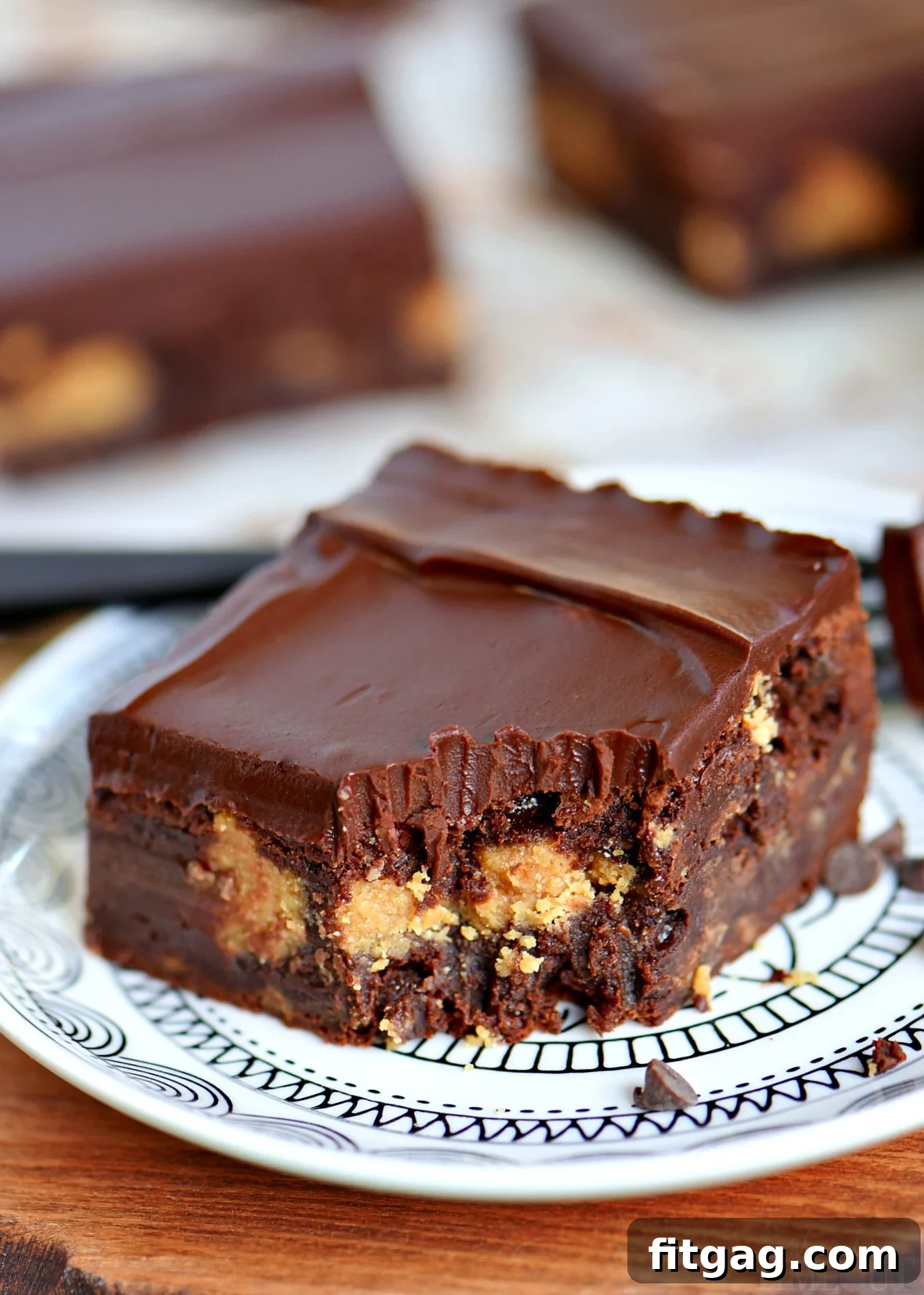 Gluten-free peanut butter brownies with a rich ganache topping, perfect for satisfying chocolate and peanut butter cravings.