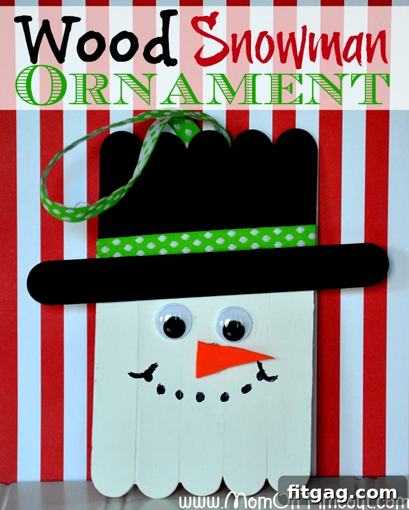 Smiling wood snowman ornament with a black hat and ribbon, perfect for a Christmas tree
