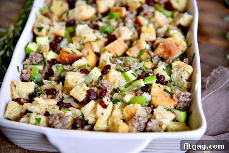 Sweet and Savory Cranberry Apple Sausage Stuffing 3 Sausage stuffing mixture, ready to be baked in a casserole dish.