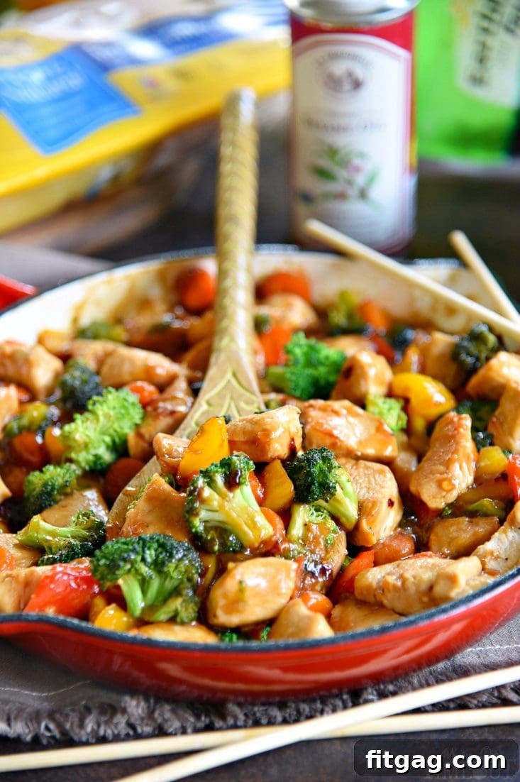 Appetizing chicken stir fry with tender chicken and crisp, colorful vegetables, served fresh from the pan.