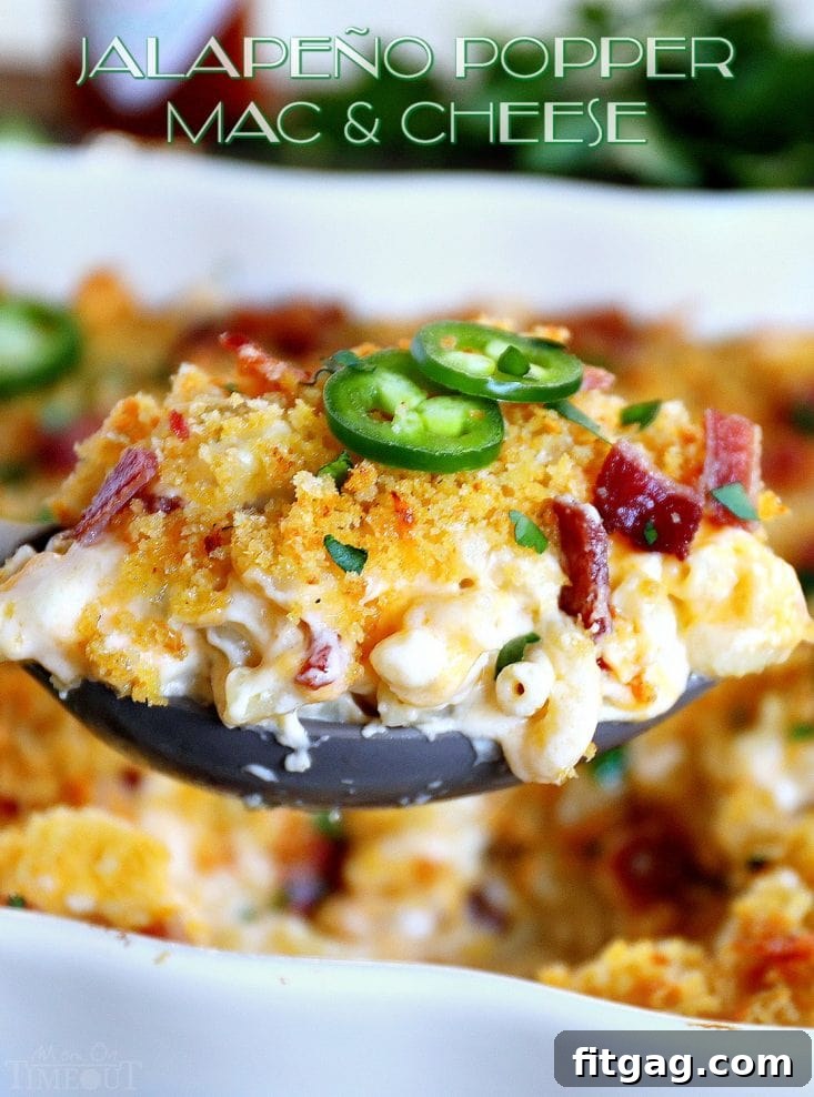 The BEST Jalapeño Popper Mac and Cheese you'll ever try! Extra creamy, loaded with bacon, cream cheese, and jalapeños, this delicious and easy mac and cheese is sure to be a new favorite! // Mom On Timeout #macandcheese #dinner #bacon #jalapeno #recipe #recipes #cheese #momontimeout jalapeno-popper-baked-mac-and-cheese-title