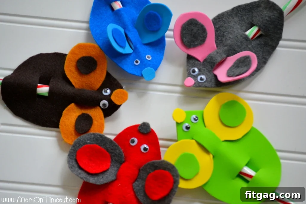 Finished collection of Candy Cane Christmas Mice with googly eyes and felt details.