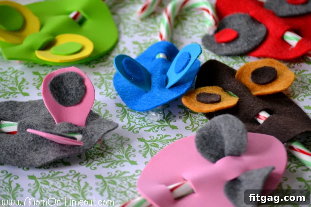 A variety of colorful Candy Cane Mice, some with googly eyes and pom-pom noses, showcasing their individual charm.