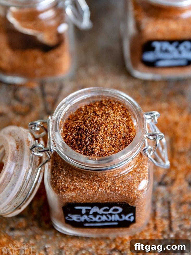 Top-down view of homemade taco seasoning in a spice jar.